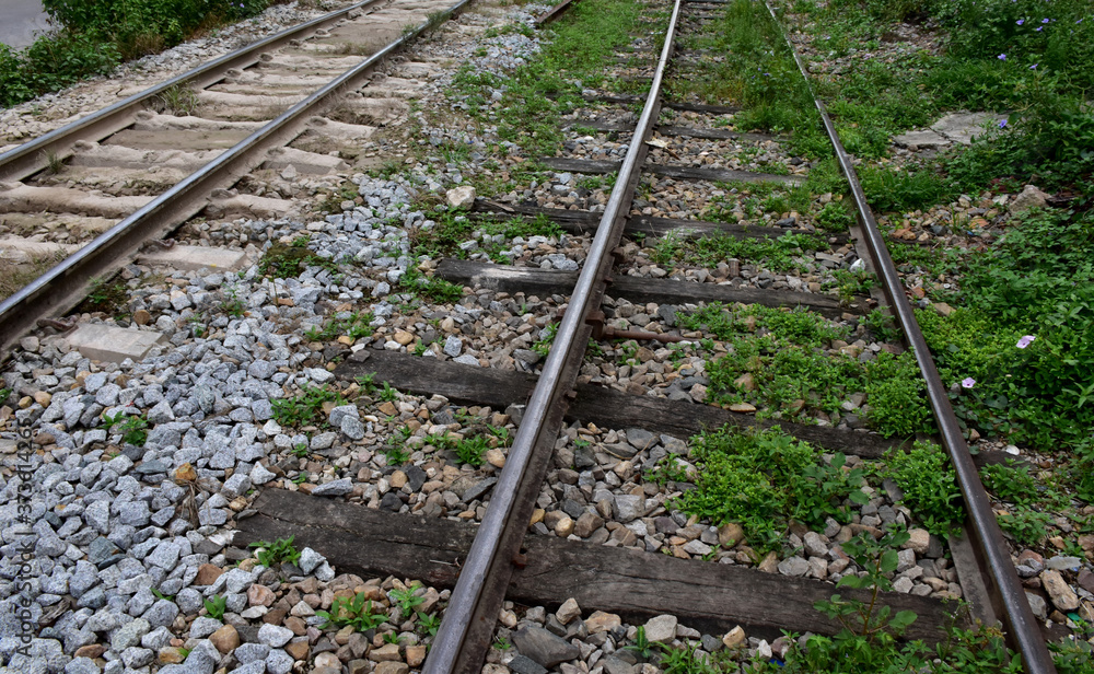 Trains running on the train tracks to the station in Thailand. Select focus with shallow depth of field. Trains running on the train tracks to the station in Thailand. Select focus with shallow depth of field.