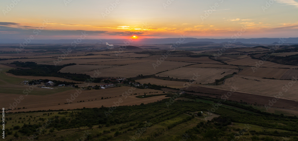 View from hill Rana in Czech central mountain landscape at summer sunset