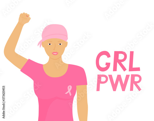 National Breast Cancer Awareness Month. African american woman was wearing a head scarf after chemotherapy and with a pink ribbon on T-shirt raised fist up.
