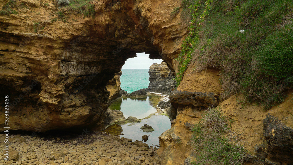 Rock arch and sea on the Great Ocean Road in Victoria, Australia