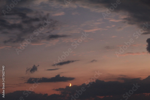 Fototapeta Naklejka Na Ścianę i Meble -  
clouds in the red sunset of a summer evening