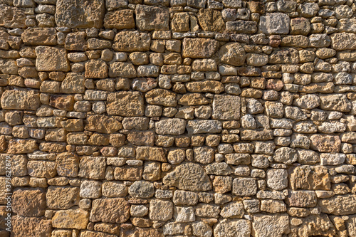 Medieval stone wall in Domme, Dordogne, France