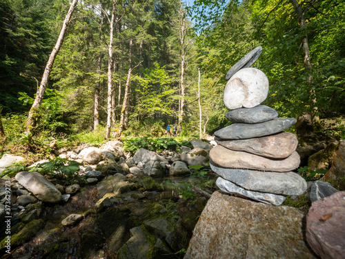 stone man (a mountain signpost) Carnic alps, Paularo, Friuli Venezia Giulia, Italy photo