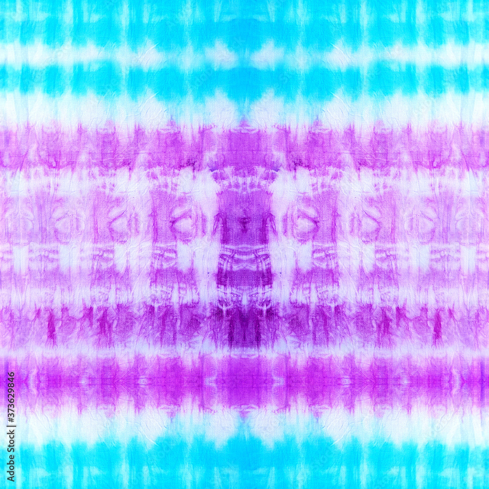 Quality genuine tie-dye repeat pattern in summer pastel shades of purple and blue. Seamless repeating pattern. 