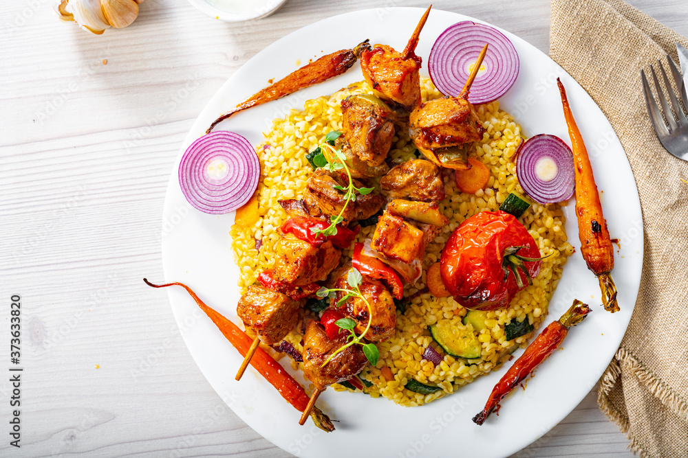 Shish kebabs with vegetables and bulgur Shish kebabs with vegetables and bulgur