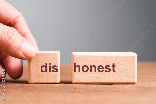 Split the Dishonest Text on Wood Block