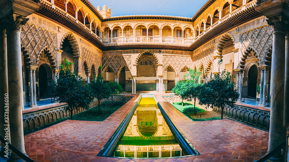 Beautiful shot of Royal Alcazar in Seville Spain - obrazy, fototapety, plakaty 