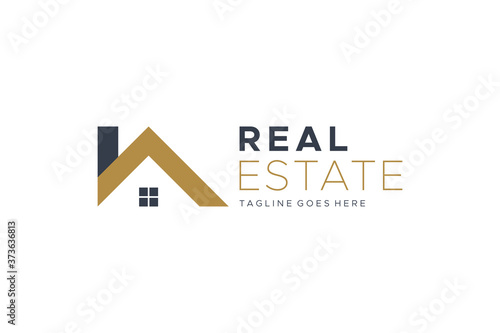 Real Estate Logo. Gold and Blue House Symbol Geometric Linear Style isolated on White Background. Usable for Construction Architecture Building Logo Design Template Element.