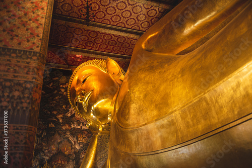 Reclining buddha statue at temple in Bangkok, Thailand