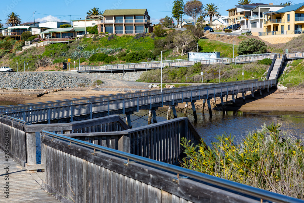 The footbridge crossing over the Onkaparinga River mouth at Port Noarlunga South Australia on August 25th 2020