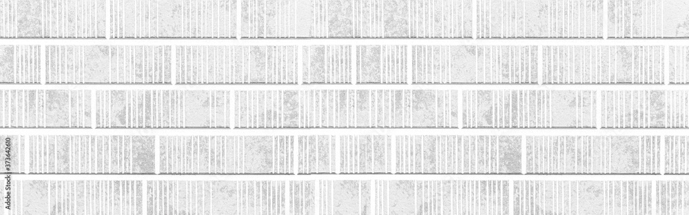 Obraz premium Panorama of Modern whitestone wall with stripes texture and seamless background