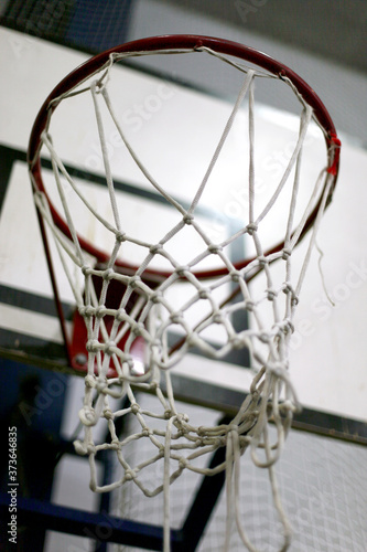Details of a basketball rim and net as a sport background © acceptfoto