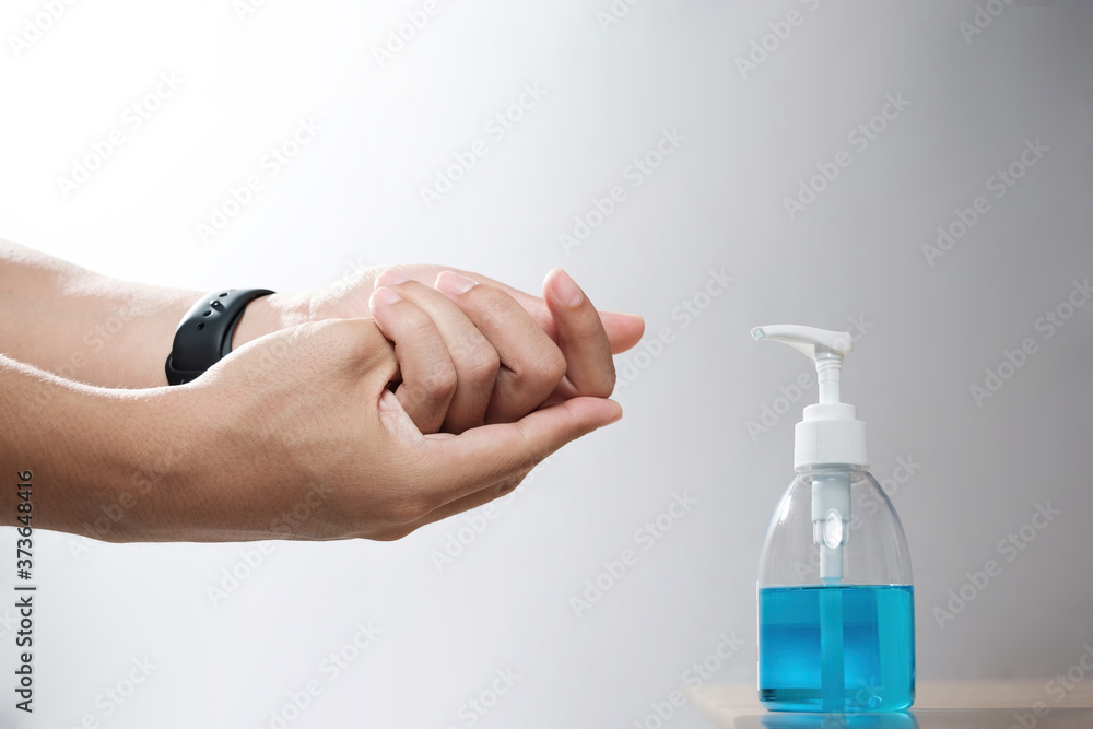 use of alcohol hand sanitiser gel for rubbing your hands before and ...