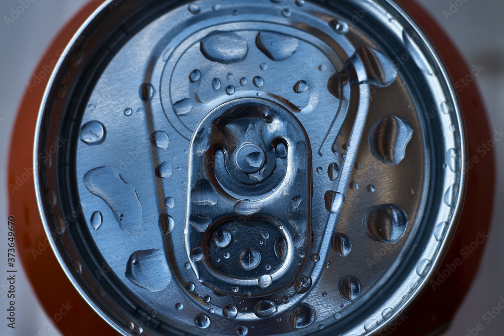 Ring push of can of fresh drink, with water drops