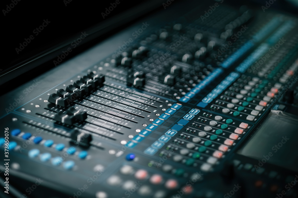 audio sound mixer controller at studio in dark background audio sound mixer controller at studio in dark background