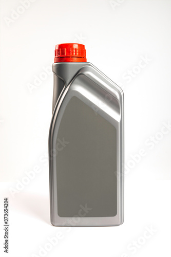 Gray plastic lubricant  oil isolated on white background. photo