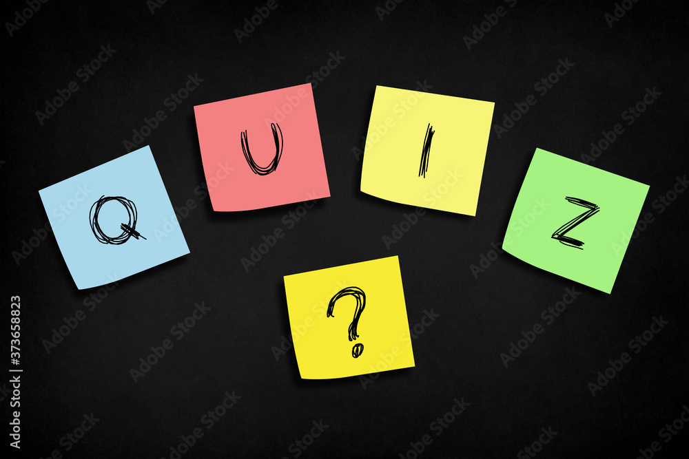 Note papers with quiz time concept design on chalkboard Note papers with quiz time concept design on chalkboard