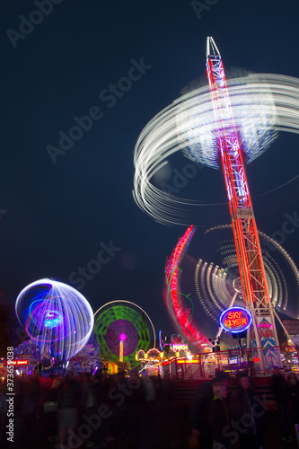 Witney Feast Funfair - Ride Light Traces, 'SkyFlyer', 'Storm', 'Air', 'Extreme' and 'Megaspin' photo