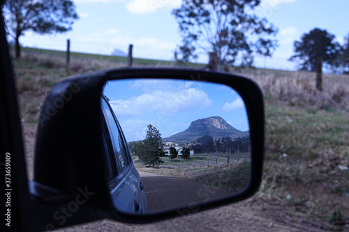 Looking back at the road on a trip