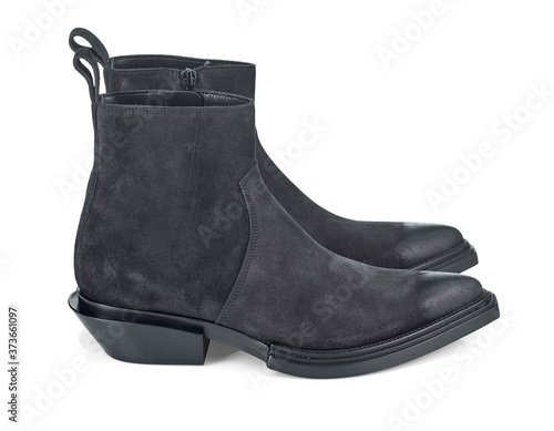 Black suede half-boots with a narrow toe and a slanted heel. Cowboy boots. Side view.
