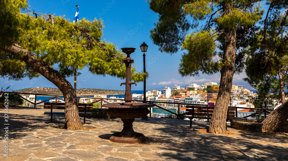 The famous viewpoint over the small harbor and lake in Agios Nikolaos on the island of Crete