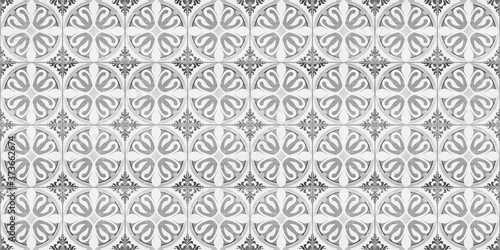 Seamless old gray grey white vintage shabby patchwork mosaic motif tiles stone concrete cement wall texture background with circle flower leaf pattern print