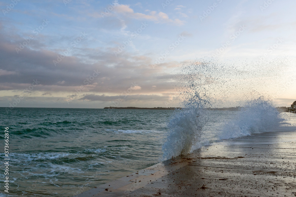 Big high tide and big waves on the Chaussée du Sillon in Saint Malo, Brittany, France
