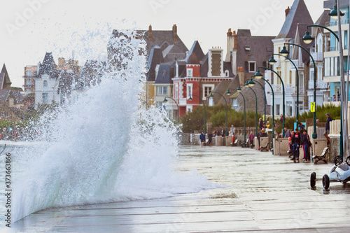 Big high tide and big waves on the Chaussée du Sillon in Saint Malo, Brittany, France