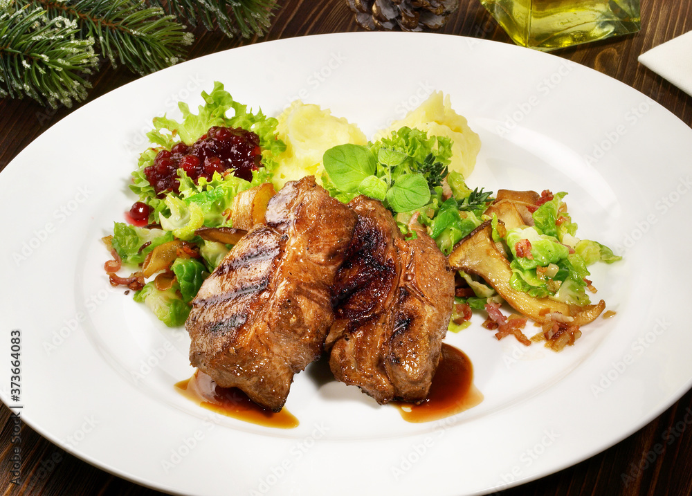 Wild Boar Steak with Vegetables and Mushrooms - Isolated Wild Boar Steak with Vegetables and Mushrooms - Isolated