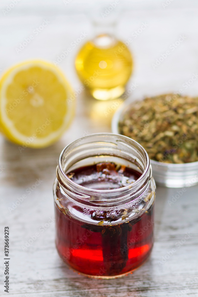Natural herbs infusion with honey and lemon Natural herbs infusion with honey and lemon