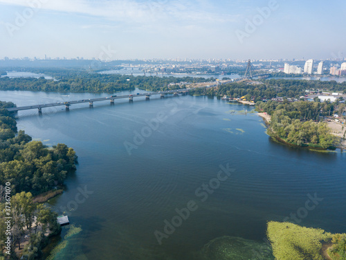 Aerial drone view of the Dnieper River in Kiev. Clear sunny day.