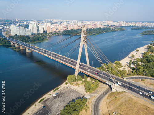 Aerial drone view. North bridge in Kiev and the Dnieper river on a clear summer morning. © Sergey