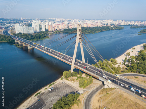 Aerial drone view. North bridge in Kiev and the Dnieper river on a clear summer morning.