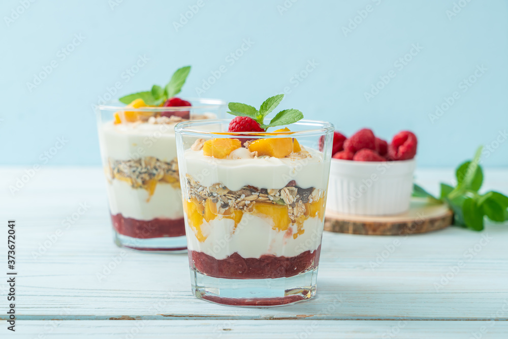 homemade mango and raspberry with yogurt and granola homemade mango and raspberry with yogurt and granola