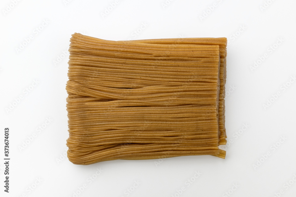 Buckwheat noodles on a white background Buckwheat noodles on a white background
