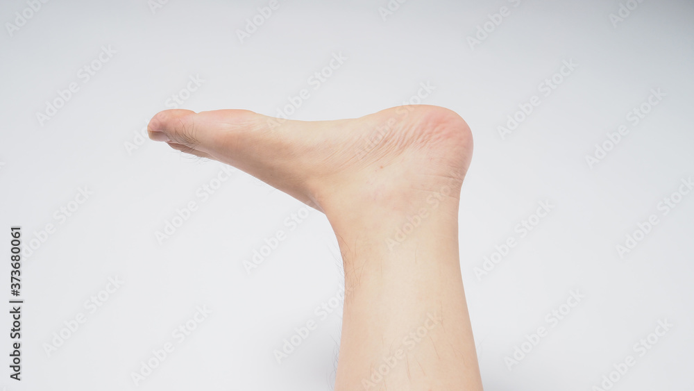 close up of man barefoot on white background close up of man barefoot on white background