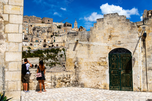 Tourists in the old town of Matera, Province of Matera, Basilicata Region, Italy