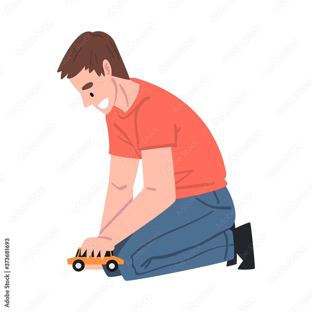 Smiling Young Man Sitting on Floor Running with Toy Car, Happy Father Character Cartoon Style Vector Illustration