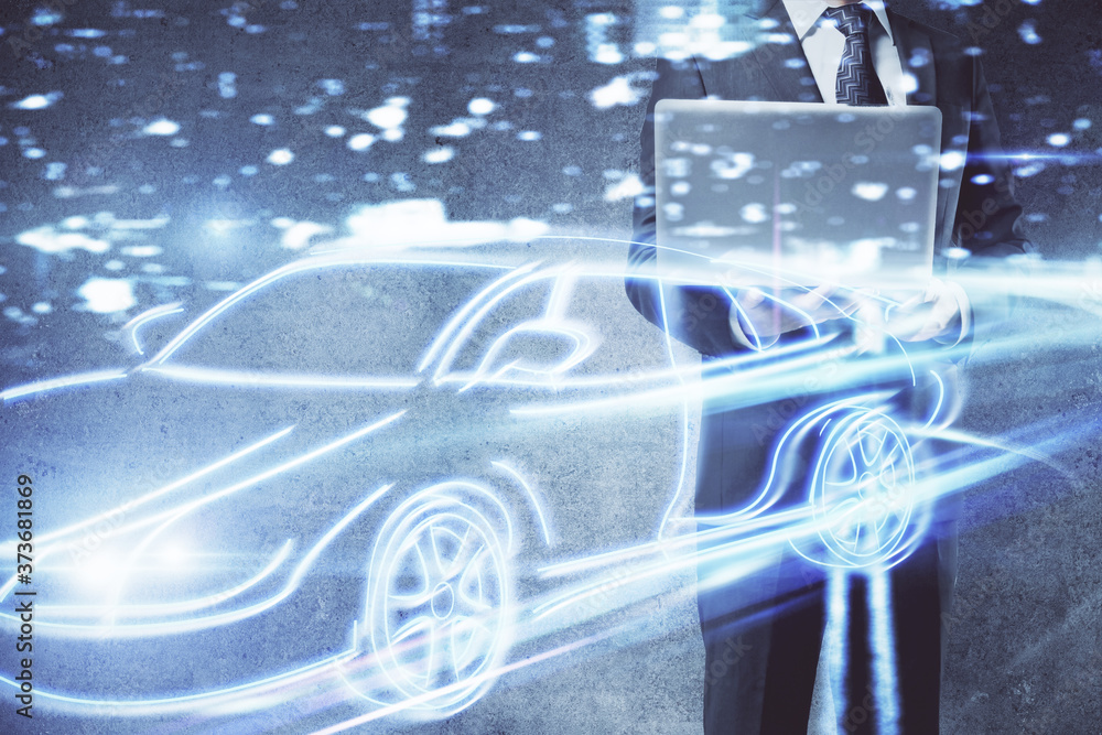 Automobile theme drawing with businessman working on computer on background. Autopilot taxi concept. Double exposure. Automobile theme drawing with businessman working on computer on background. Autopilot taxi concept. Double exposure.