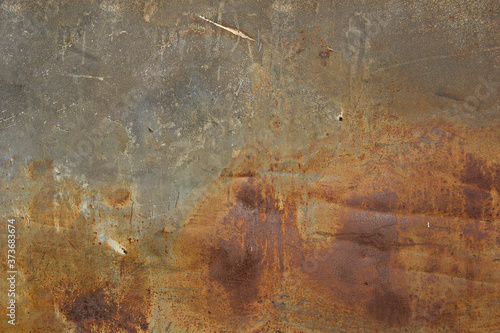 Grunge rusted metal texture. Rusty corrosion and oxidized background. Worn metallic iron panel. Horizontal
