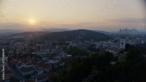Wallpaper Mural Aerial 4k view, beautiful castle on the hill and city of Ljubljana under with the sunset in the background Torontodigital.ca