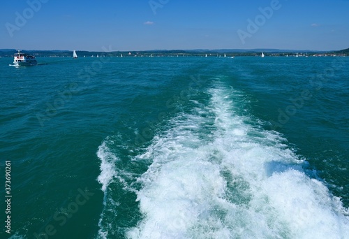Rear view from ship to sea . Wave and foam. Marine background.