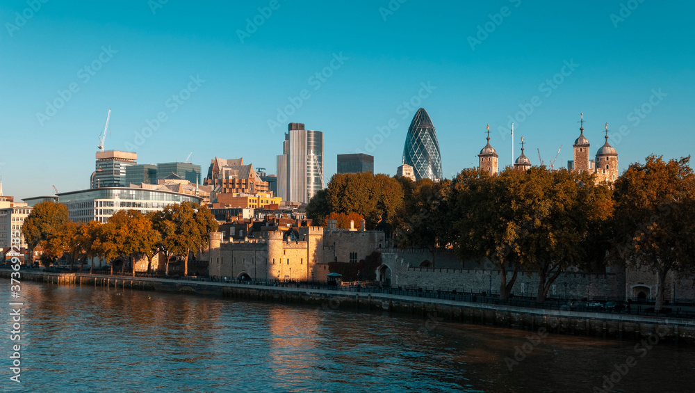 London, England - October 05, 2007: The Tower of London and London City Skyline before of the Walkie Talkie and Cheese grater Buildings were built.