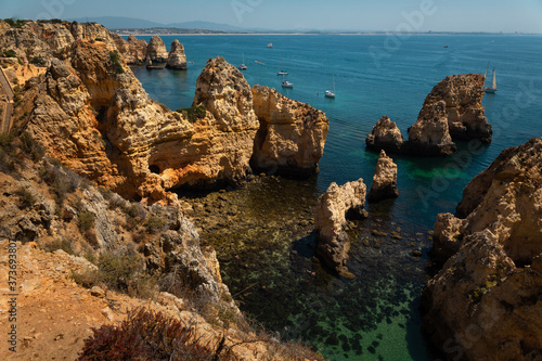 Coves and cliffs at Ponta da Piedade the most famous spot of Algarve region, in Portugal.