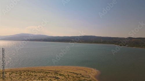 4K aerial drone clip flying sideways over the beach near Strymonas river in Macedonia, Greece photo