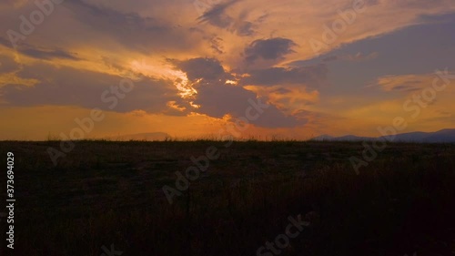 4K clip of Sunset over a grain field in Drama, Greece