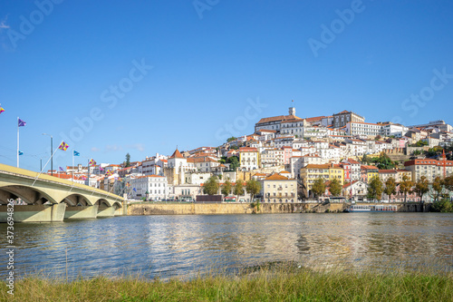 Coimbra cityscape with Santa Clara Bridge over Mondego river, Portugal