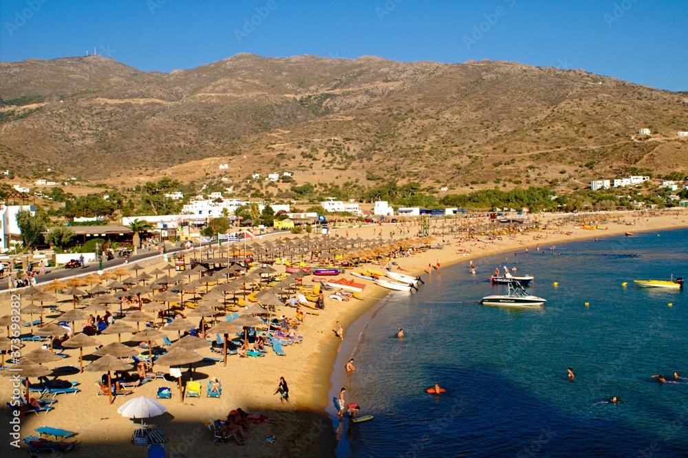 Beach seats and umbrellas on Mylopotas bay, Ios island, Cyclades islands, Greece, July 21 2008. Beach seats and umbrellas on Mylopotas bay, Ios island, Cyclades islands, Greece, July 21 2008.