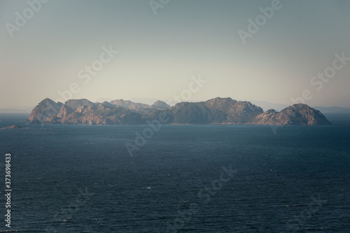 Far look at the Cies Islands (Illas Cies) from the mainland of Galicia. photo