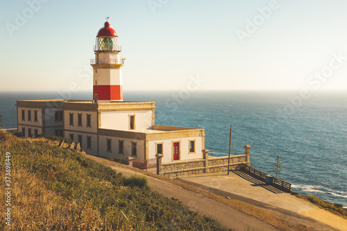 Cape Silleiro Lighthouse in front of the Atlantic Ocean at Baiona, Galicia.
